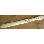 Victorian carved ivory paper knife, with reeded shaped handle and floral and leaf carved mount L30cm