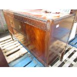 Geo.III style mahogany side board with two central drawers and two cupboard doors, with makers