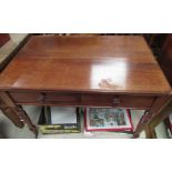 Victorian mahogany writing table, rounded rectangular top with two frieze drawers and turned