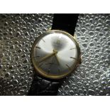 Vintage hound wound fashion watch, gold plated case on black leather strap, 17 jewel movement,