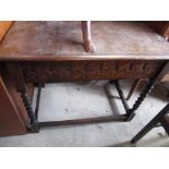 Geo. III style oak rectangular centre table with moulded top and carved frieze on barley twist