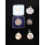 Hallmarked Sterling silver coin brooch, two Hallmarked Sterling silver sovereign cases gross 2.25ozt
