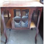 Edwardian mahogany centre table, shaped rectangular top above two doors with four convex glass