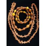 Graduated butterscotch amber beaded necklace L80cm 69.6g and a Coral necklace in a painted red box