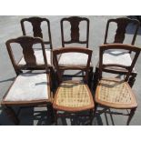 Pair of Edwardian walnut cane seat bedroom chairs, stamped WP and a set of four 1930's oak dinning
