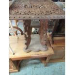 20th C Indian occasional table the square top carved with elephants foliage and deity figures on