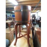 Oak coopered barrel type jardinière on stand with makers plaque R.A.Lister