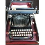 Vintage Corona folding portable typewriter with QWERTY keyboard, in original case with facsimile