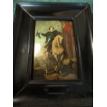 Printed panel of a man on horse back in ebonized frame 17x21cm