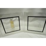 Chanel - six perspex floating display cases with a collection of Factice dummy perfumes including