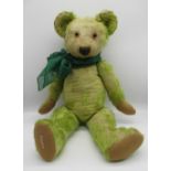 Chad Valley c. 1920/30s teddy bear in green mohair with button in ear and label on foot, glass eyes,