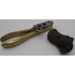 Brass two sectional small .36 cal bullet mould and a pair of small checkered pistol grips (2)