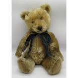 Chiltern Hugmee teddy bear c. 1950s in brown plush with original plastic dog nose, glass eyes,