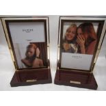 Gucci - two counter top jewellery mirrors with gilt frames on simulated rosewood bases W21cm