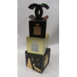 Chanel - set of three graduating square illuminated Christmas display boxes, 13cm and a small Chanel