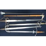 Four various assorted Spanish made decorative medieval style wall hanging swords and two walking