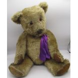 Large c. 1940's Chiltern teddy bear in blonde mohair, with glass eyes and wire jointed arms and