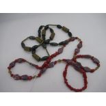 Two strings of African tribal bead necklaces