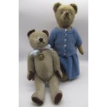 Circa 1930's possibly French teddy bear, in blonde mohair, with pale glass eyes, jointed arms and