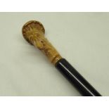 Victorian ebonised walking stick, polished antler handle carved as a large nosed man, with metal