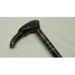 Early C20th sectional horn walking stick with elephant carved horn handle and metal tip, L86cm