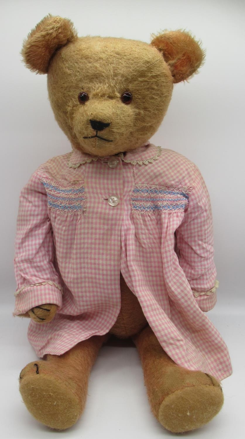 Circa 1920's American bear, in deep pink mohair, with glass eyes, jointed arms and legs and swivel