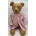 Circa 1920's American bear, in deep pink mohair, with glass eyes, jointed arms and legs and swivel