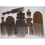 Collection of seven various carved wood African native combs