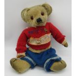 Merrythought c. 1930's teddy bear with glass eyes, Merrythought label on foot, jointed arms and legs