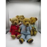 Collection of British teddy bears: c. 1940's Chiltern teddy bear with glass eyes, jointed arms and