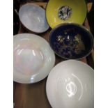 Five Carlton Ware bowls including a mottled orange lustre bowl and a blue lustre bowl etc