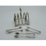 Eliz.II hallmarked silver five bar toast rack and three pairs of silver sugar tongs, 1.1ozt gross