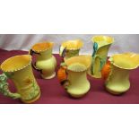 Art Deco Burgess & Leigh Ltd Burleigh Ware jugs: three parrot handled jugs, butterfly handled jug,