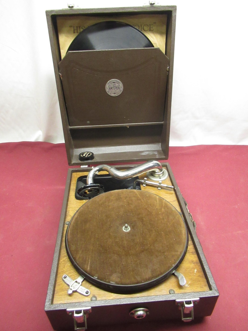 1930's Antoria wind up portable gramophone player in brown leatherette case. REG no 4901089