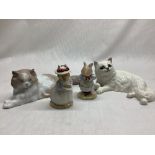 Beswick white reclining cat No 1876 and a Nao reclining cat No, a Royal Doulton Mr apple no.dbh 2