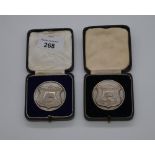Two cased Berwickshire High School sports champion medals awarded to Wilson A.Dryburgh 1941 and