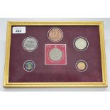 Framed and mounted display of 18 commemorative crowns including 1937 Churchill, royal weddings