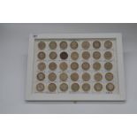 Framed and mounted displays of 35 special £2 coins including: Brunel, Triple Helix, Trinity House,