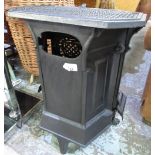 Small French style cast metal stove with top grill W41cm D35cm H54cm