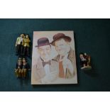 Large print of Laurel and Hardy and three sets of ceramics including "Kings of Comedy"