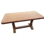 Robert Mouseman Thompson - oak coffee table, rectangular adzed top on faceted baluster supports on