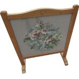 Albert Eagleman Jeffray - oak fire screen, arched top with floral woolwork glazed panel on stepped