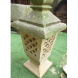 Stone Japanese lantern with tapering stepped top and openwork body on square tapering base H60cm