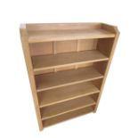 Robert Mouseman Thompson - oak bookcase with galleried top and four adjustable shelves, carved