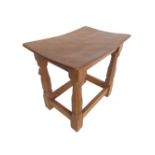 Robert Mouseman Thompson - oak joint type stool, dished adzed top on octagonal baluster supports