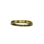 Boodles "Kit and Kaboodle" 18ct yellow gold bangle set with three princess cut diamonds on a