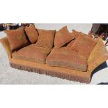 Country house Knole type sofa, upholstered in Renaissance chenille with pineapple finials with