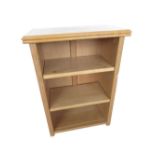 Robert Mouseman Thompson - small oak bookcase with moulded adzed top and two adjustable shelves,