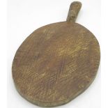 Robert Mouseman Thompson - oval oak cheeseboard, curved handle carved with signature mouse, L38cm