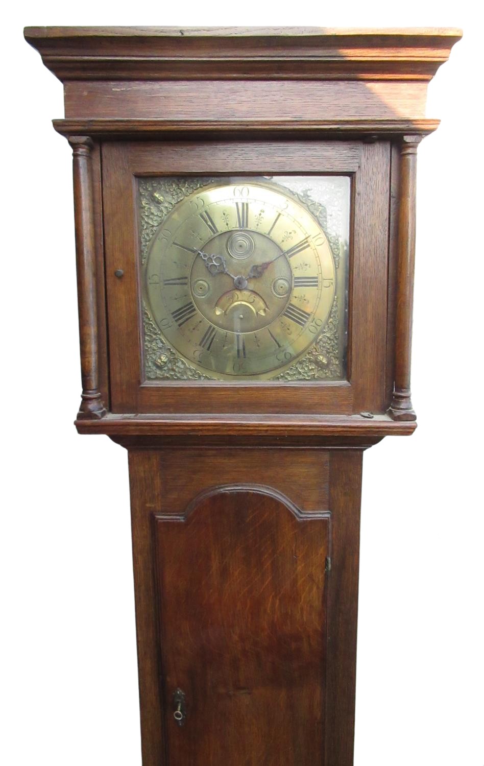 Late C18th oak long case clock, flat topped hood with turned columns, Roman dial with Arabic five